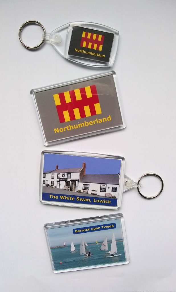 picture of some key rings and fridge magnets that I make.